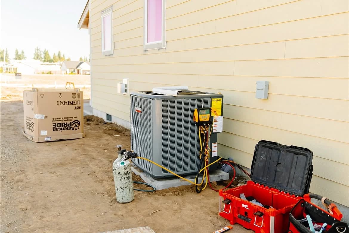 Outdoor HVAC equipment and service tools at a Whirlwind installation
